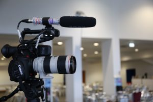 Canon C100 Mark II with Canon EF 70-200mm lens attached