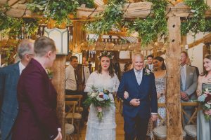 Becca walking down the aisle